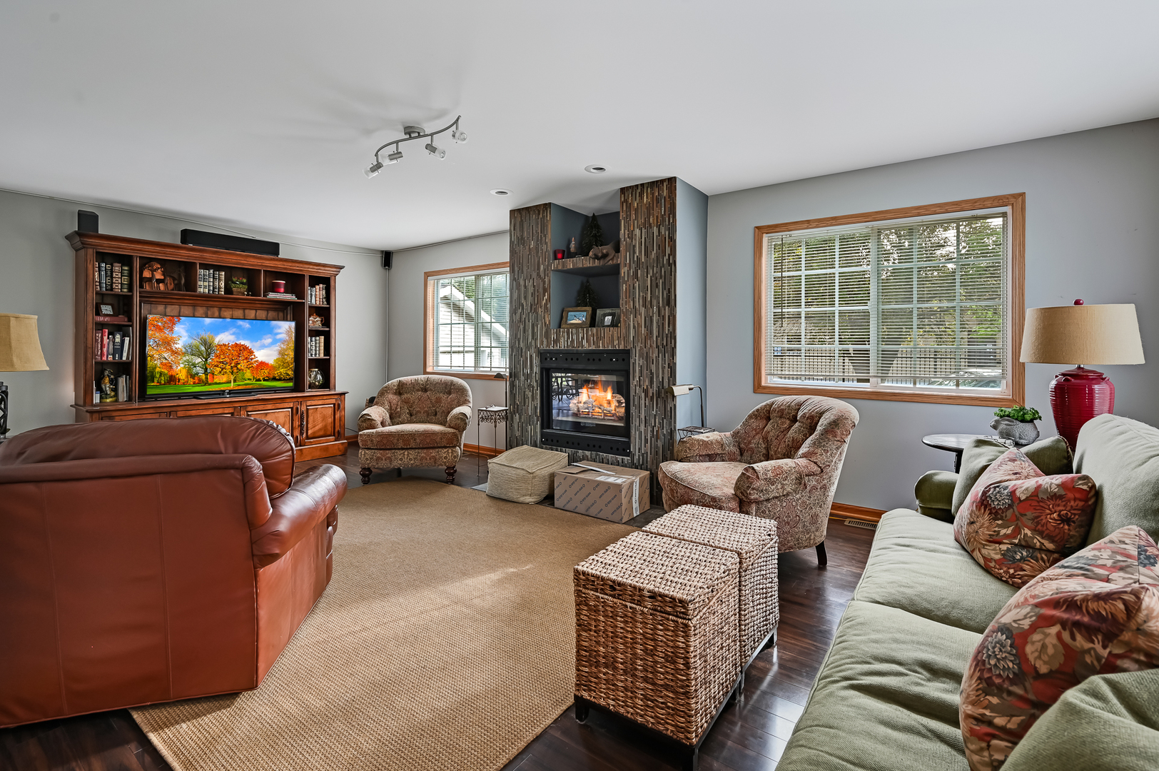 1934 Manning Road Darien, IL 60561 - Photo 7 of 14 a living room with furniture large window and flat screen tv