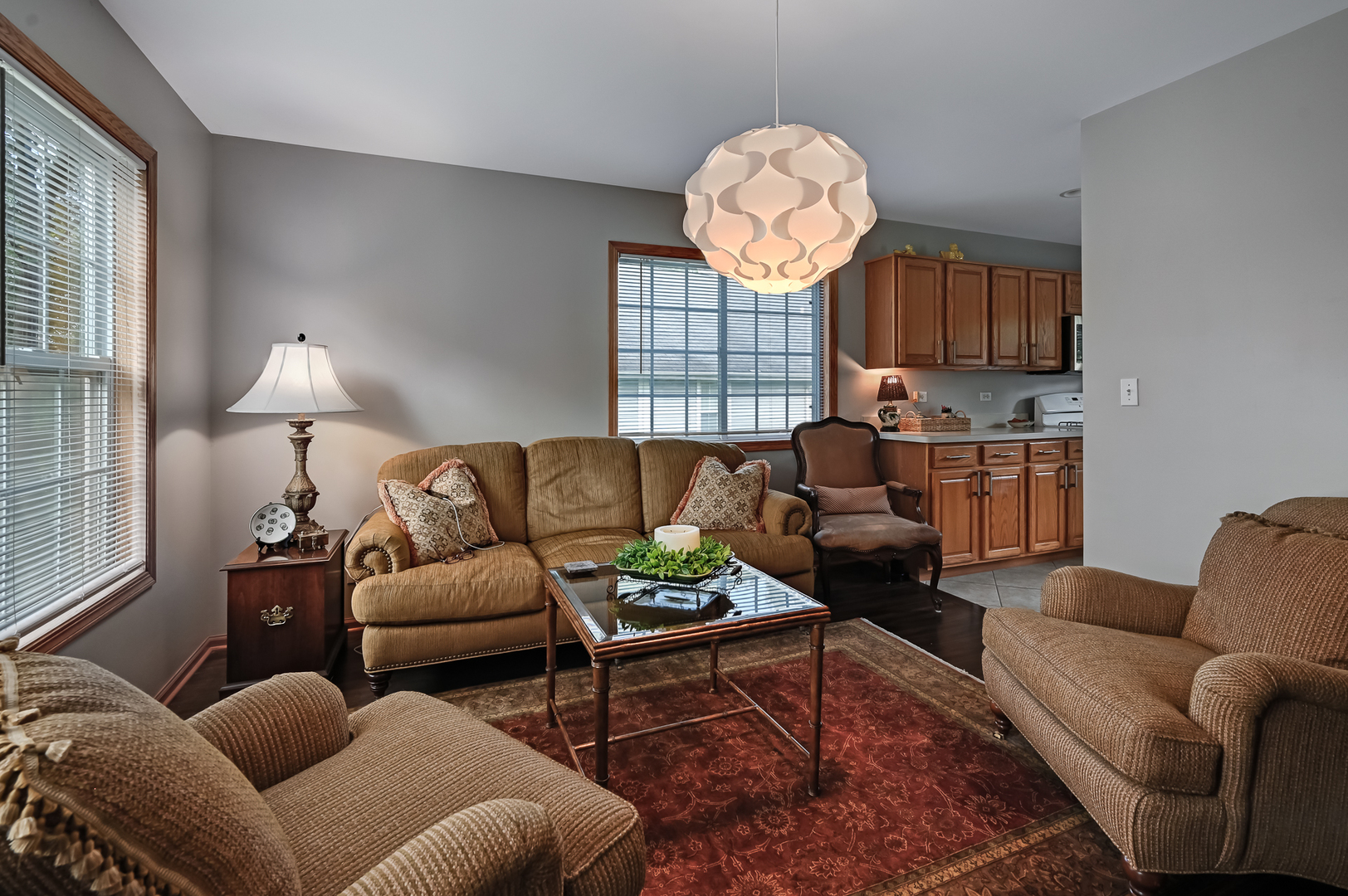 1934 Manning Road Darien, IL 60561 - Photo 8 of 14 a living room with furniture a rug and a window