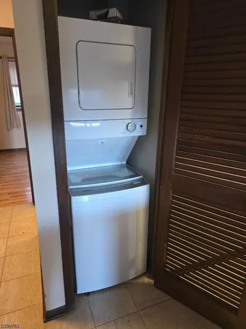 a utility room with washer and dryer