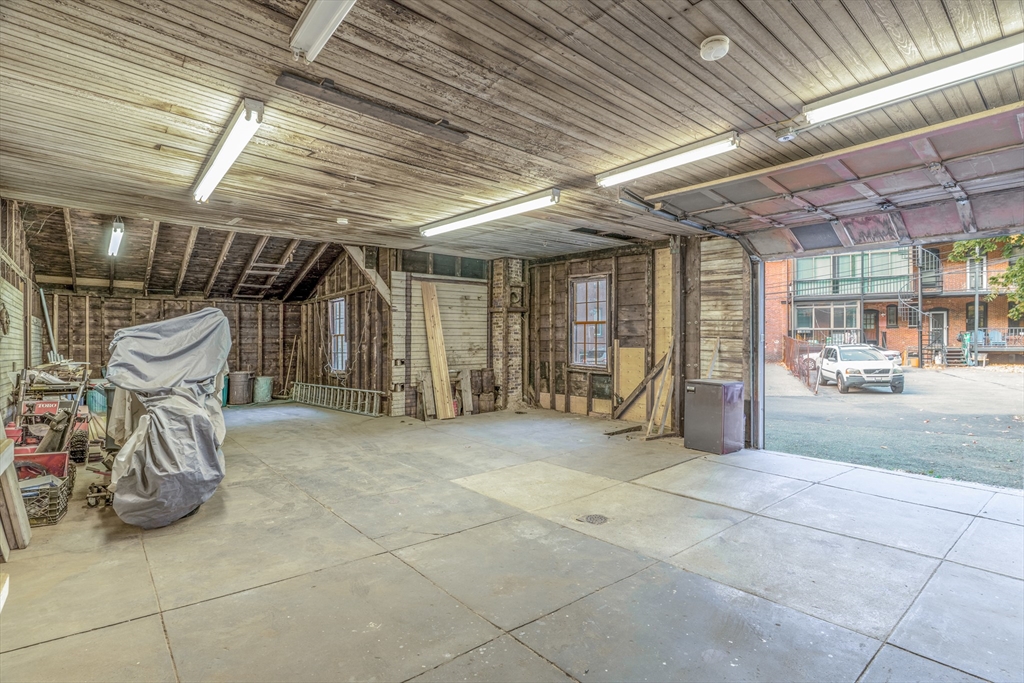 12 Thayer Street Brookline, MA 02445 - Photo 3 of 12 a view of a garage with refrigerator