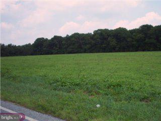 L:40 Centerton Road Pittsgrove, NJ 08318 - Photo 2 of 3 a view of field with lush green forest