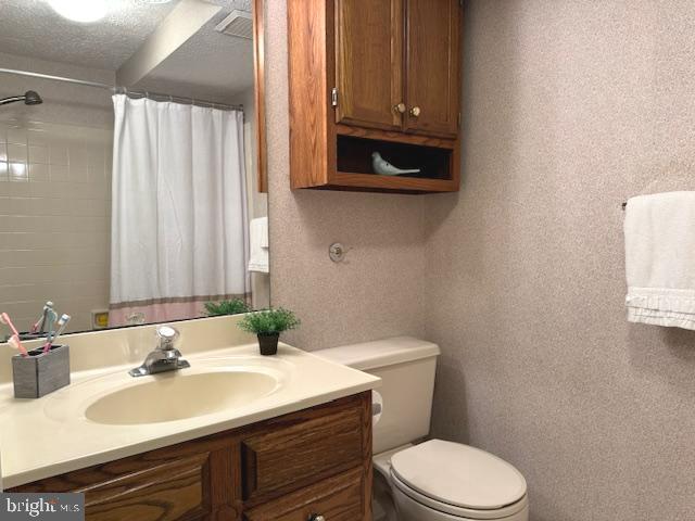 1 Inverness Circle Marlton, NJ 08053 - Photo 14 of 19 a bathroom with a sink a toilet and mirror