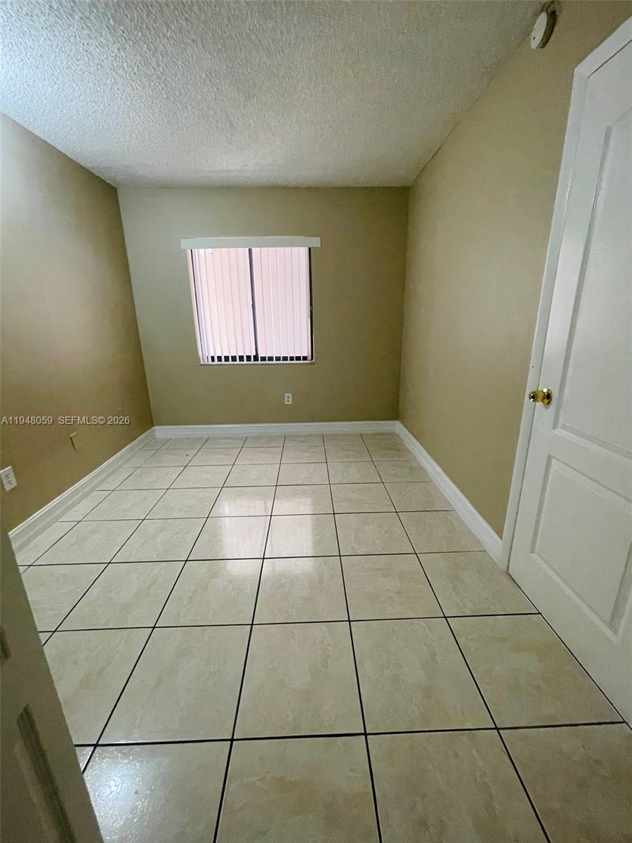 8400 Southwest 133rd Avenue Road, Unit 107 Miami, FL 33183 - Photo 13 of 21 a view of empty room