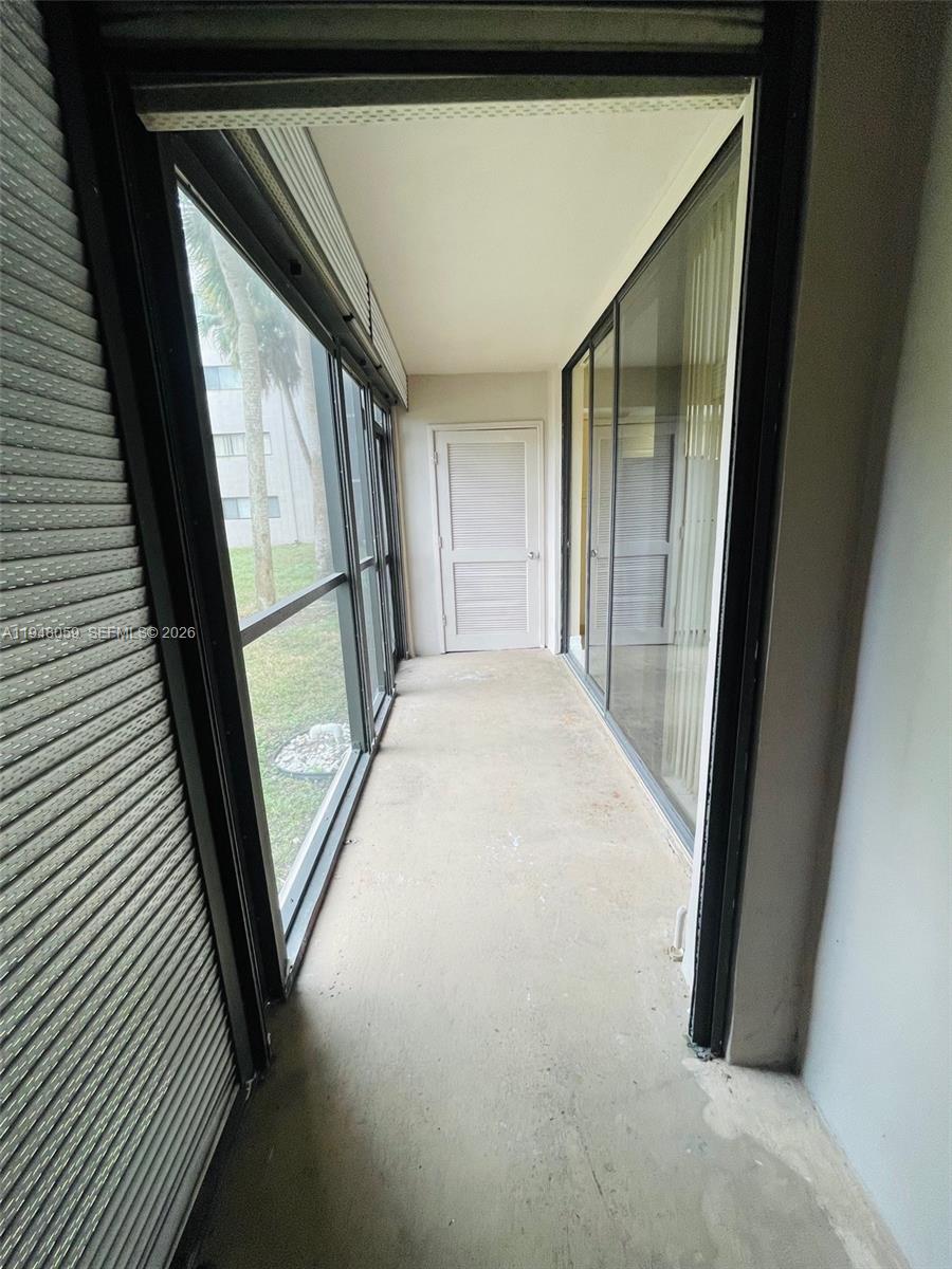 8400 Southwest 133rd Avenue Road, Unit 107 Miami, FL 33183 - Photo 17 of 21 a view of a hallway