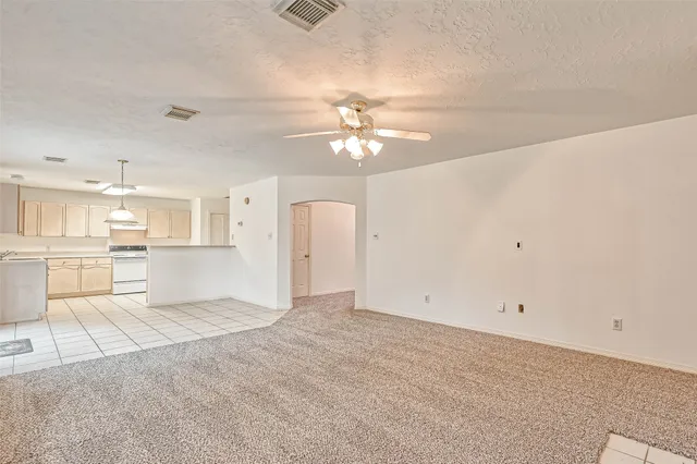 a bathroom with a sink a mirror and a vanity