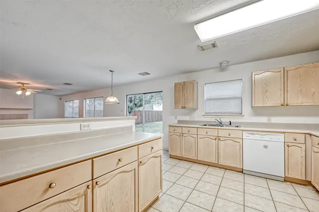 a bathroom with a sink a mirror and a shower