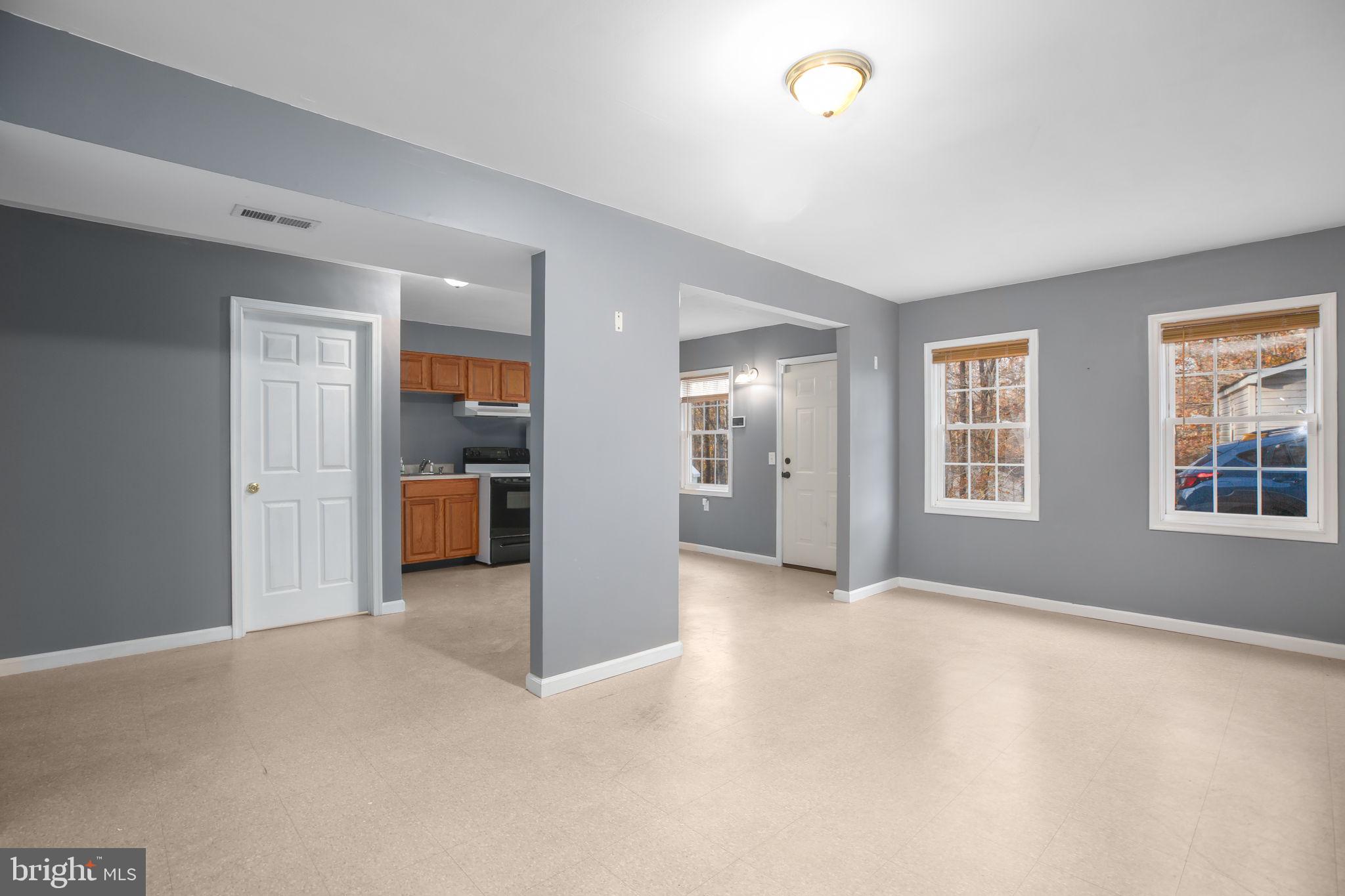 315 Sandy Ridge Road Fredericksburg, VA 22405 - Photo 26 of 42 a view of a livingroom with a staircase