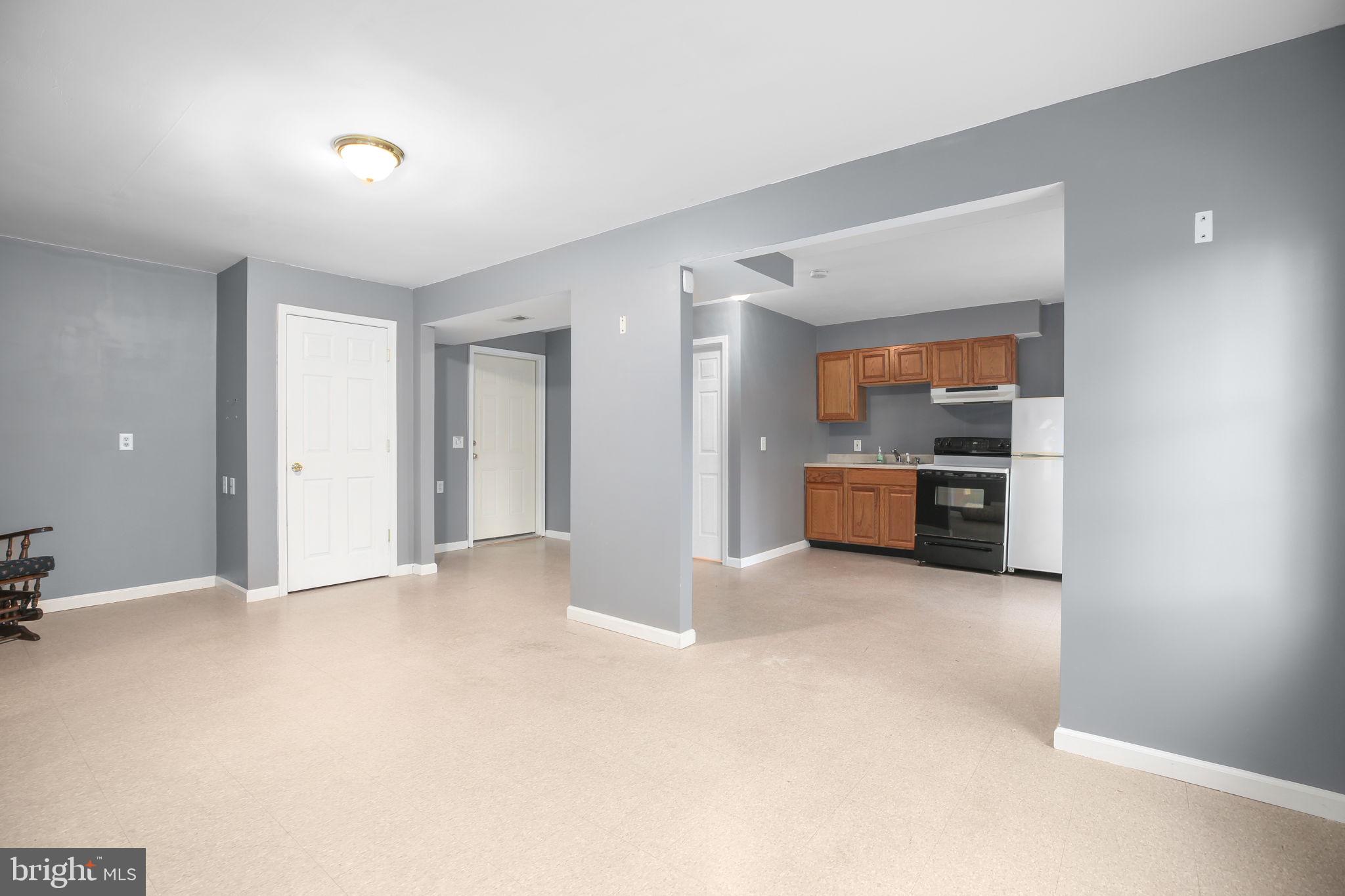 315 Sandy Ridge Road Fredericksburg, VA 22405 - Photo 27 of 42 a view of a kitchen with a sink and a stove top oven