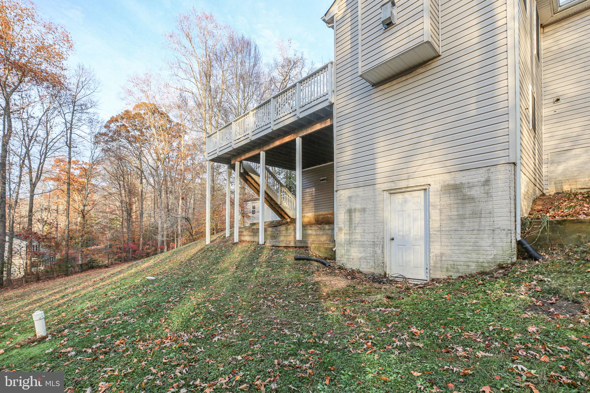 315 Sandy Ridge Road Fredericksburg, VA 22405 - Photo 40 of 42 a view of a house with a yard