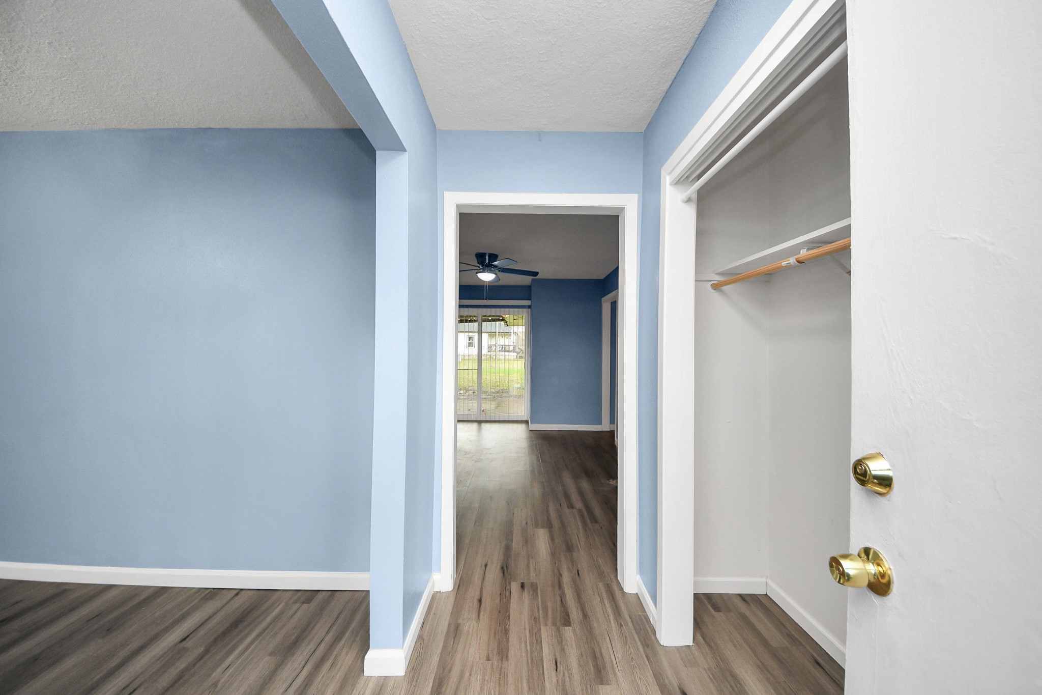 11510 Lockgate Lane Houston, TX 77048 - Photo 2 of 22 a view of hallway with wooden floor