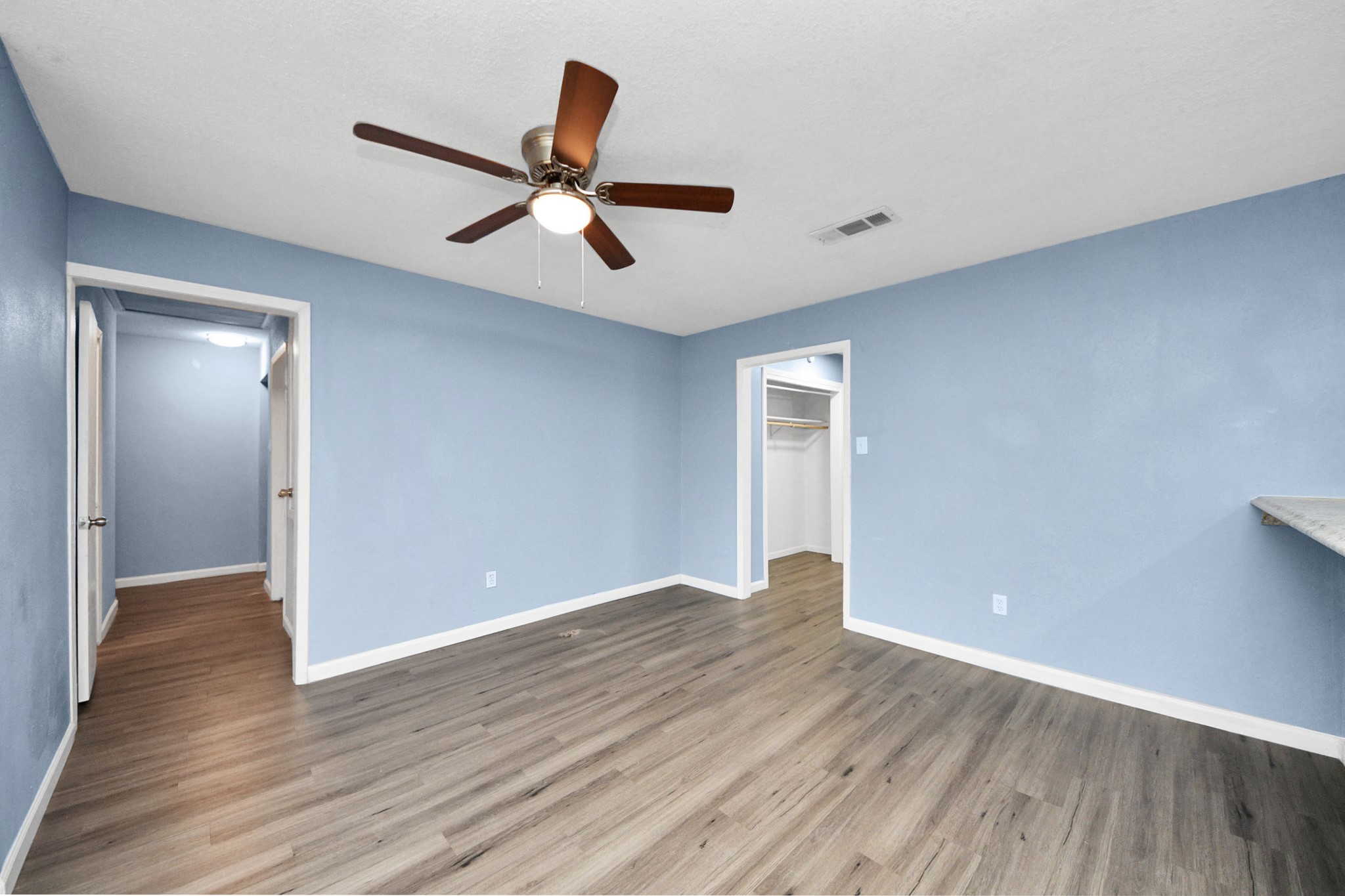 11510 Lockgate Lane Houston, TX 77048 - Photo 6 of 22 a view of empty room with wooden floor