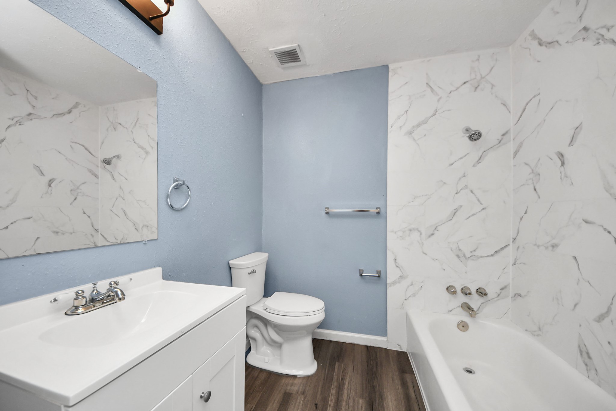 11510 Lockgate Lane Houston, TX 77048 - Photo 10 of 22 a bathroom with a bathtub sink mirror and toilet