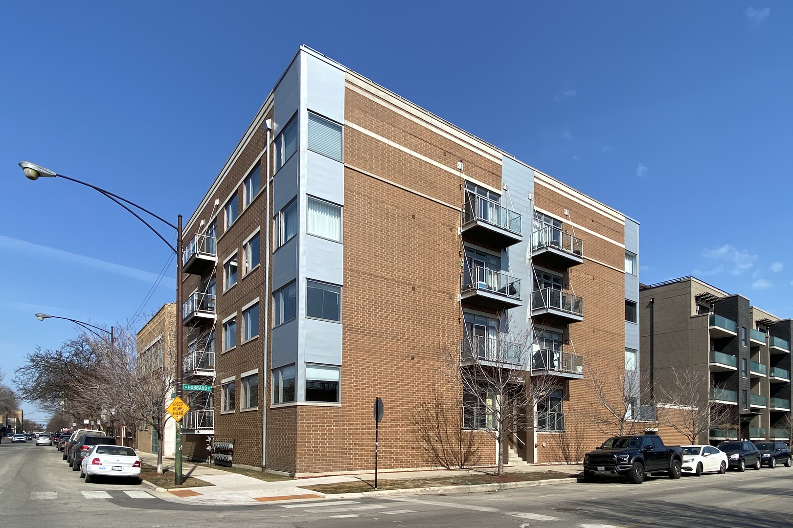 a front view of a building with street view