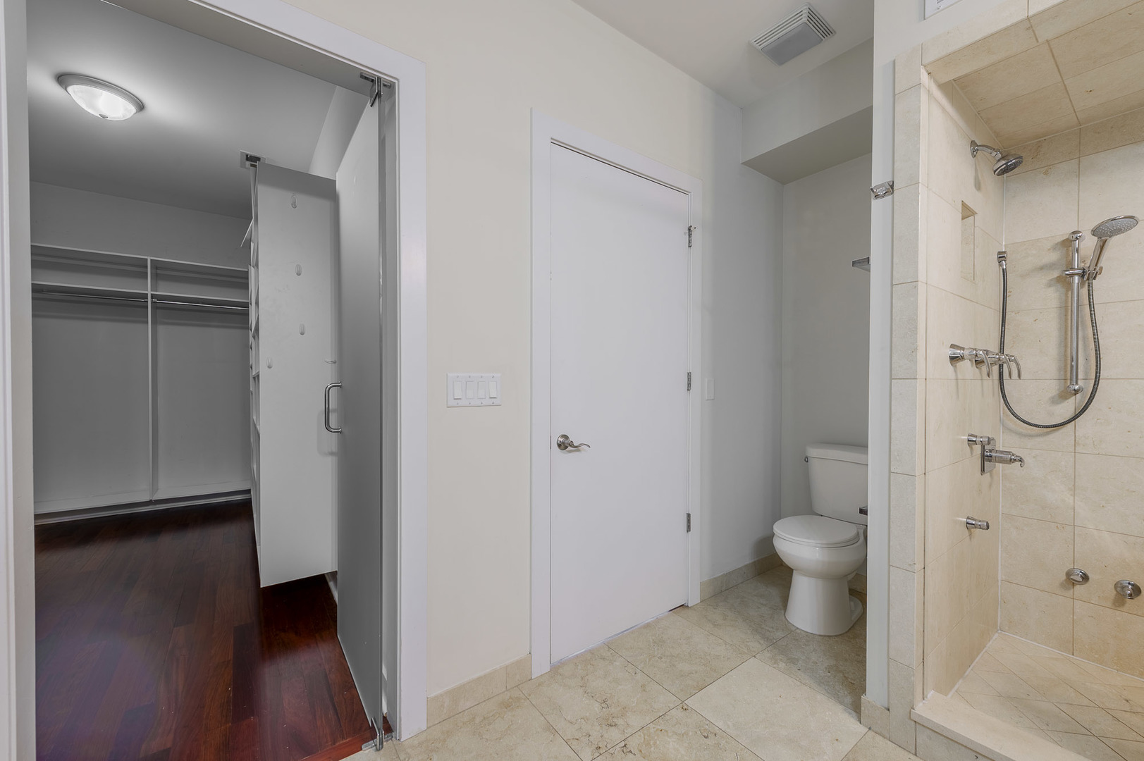 1162 West Hubbard Street, Unit 203 Chicago, IL 60642 - Photo 14 of 22 a bathroom with a granite countertop sink toilet and shower