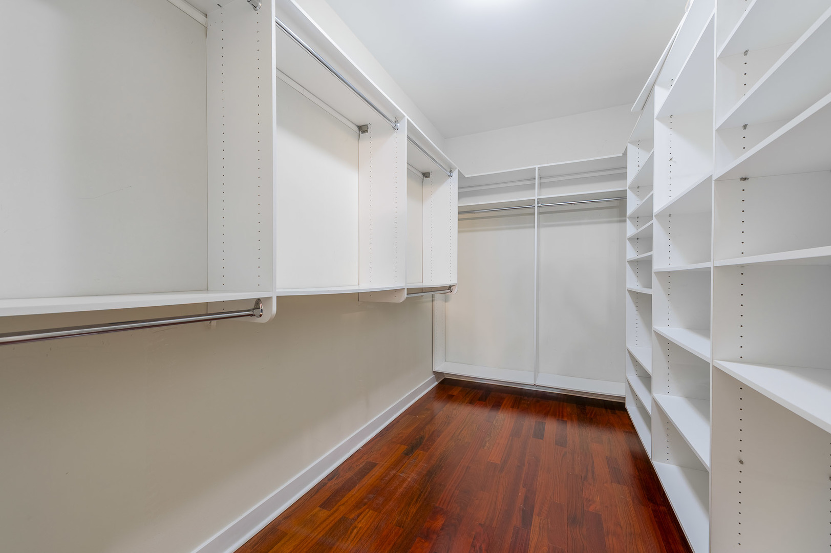 1162 West Hubbard Street, Unit 203 Chicago, IL 60642 - Photo 15 of 22 a view of a room with wooden floor and closet