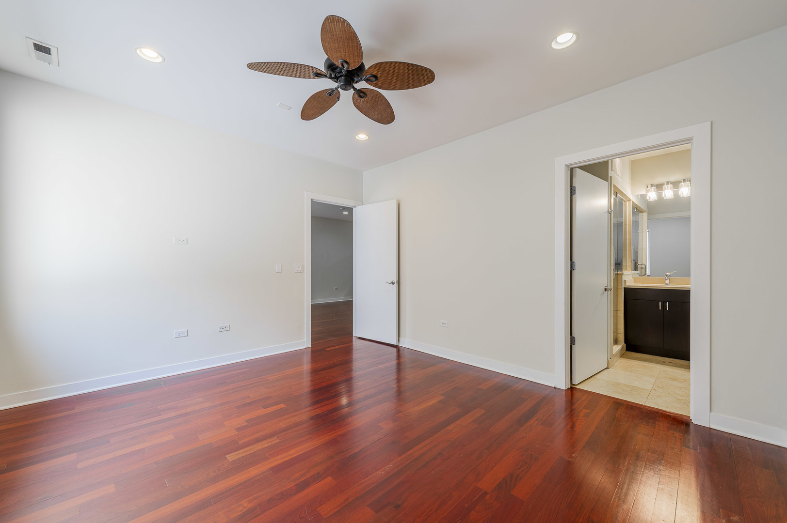 1162 West Hubbard Street, Unit 203 Chicago, IL 60642 - Photo 9 of 22 a view of empty room with wooden floor