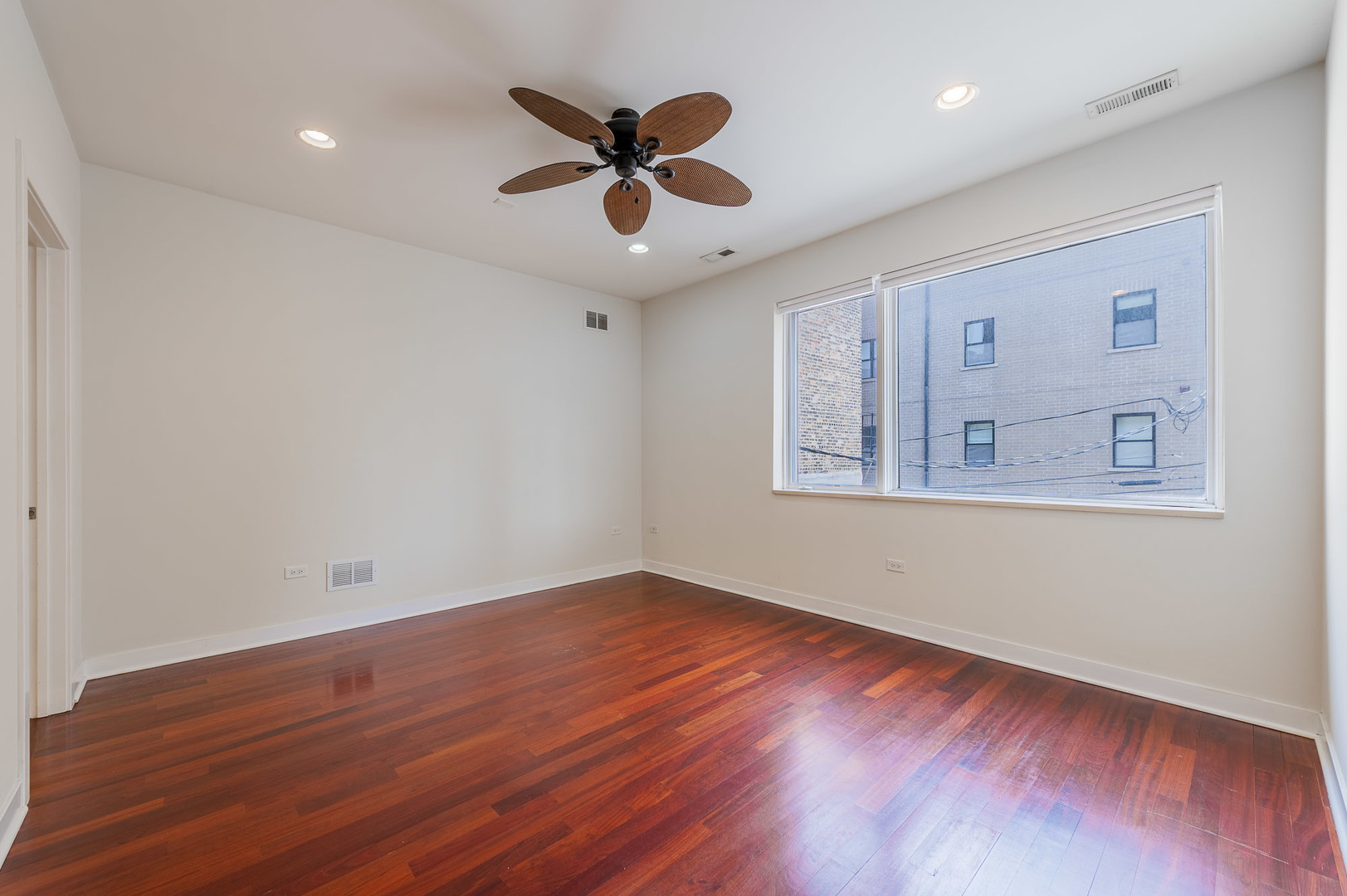 1162 West Hubbard Street, Unit 203 Chicago, IL 60642 - Photo 10 of 22 a view of empty room with wooden floor