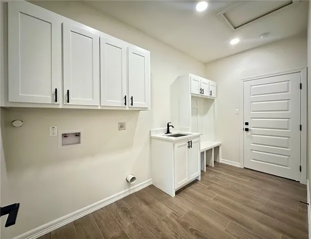 a view of cabinets with wooden floor