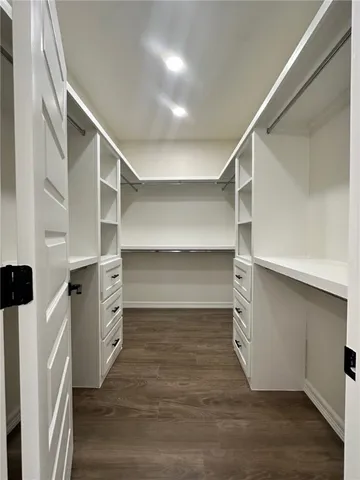 a view of an empty walk in closet