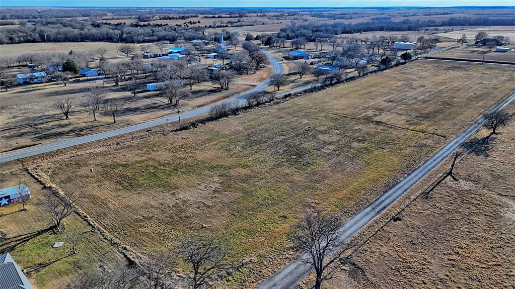Tbd East Howell Street St. Jo, TX 76265 - Photo 8 of 13 a view of a backyard of a house