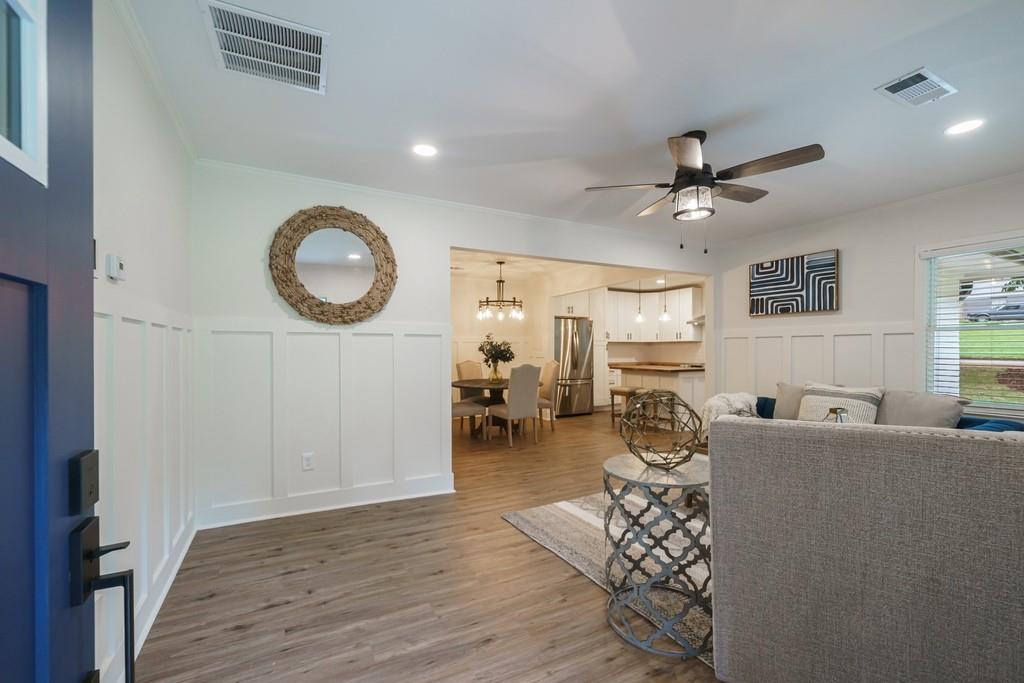2359 Mark Trail Decatur, GA 30032 - Photo 11 of 35 a living room with furniture and a wooden floor