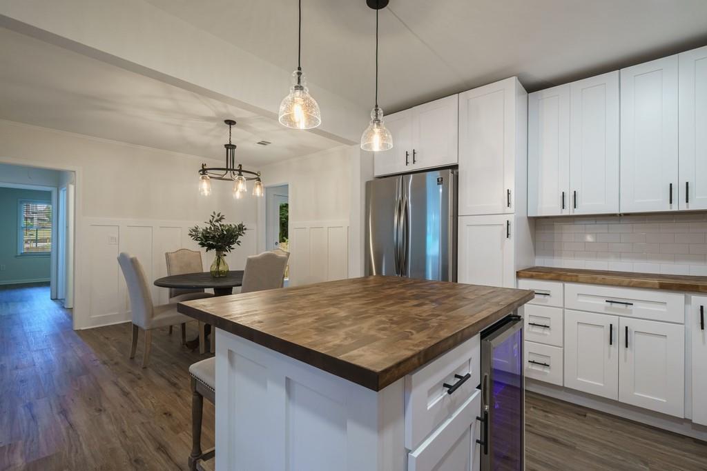 2359 Mark Trail Decatur, GA 30032 - Photo 15 of 35 a kitchen that has a kitchen center island and stainless steel appliances