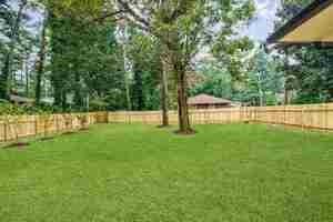 2359 Mark Trail Decatur, GA 30032 - Photo 2 of 35 a view of yard with green space and house in the background