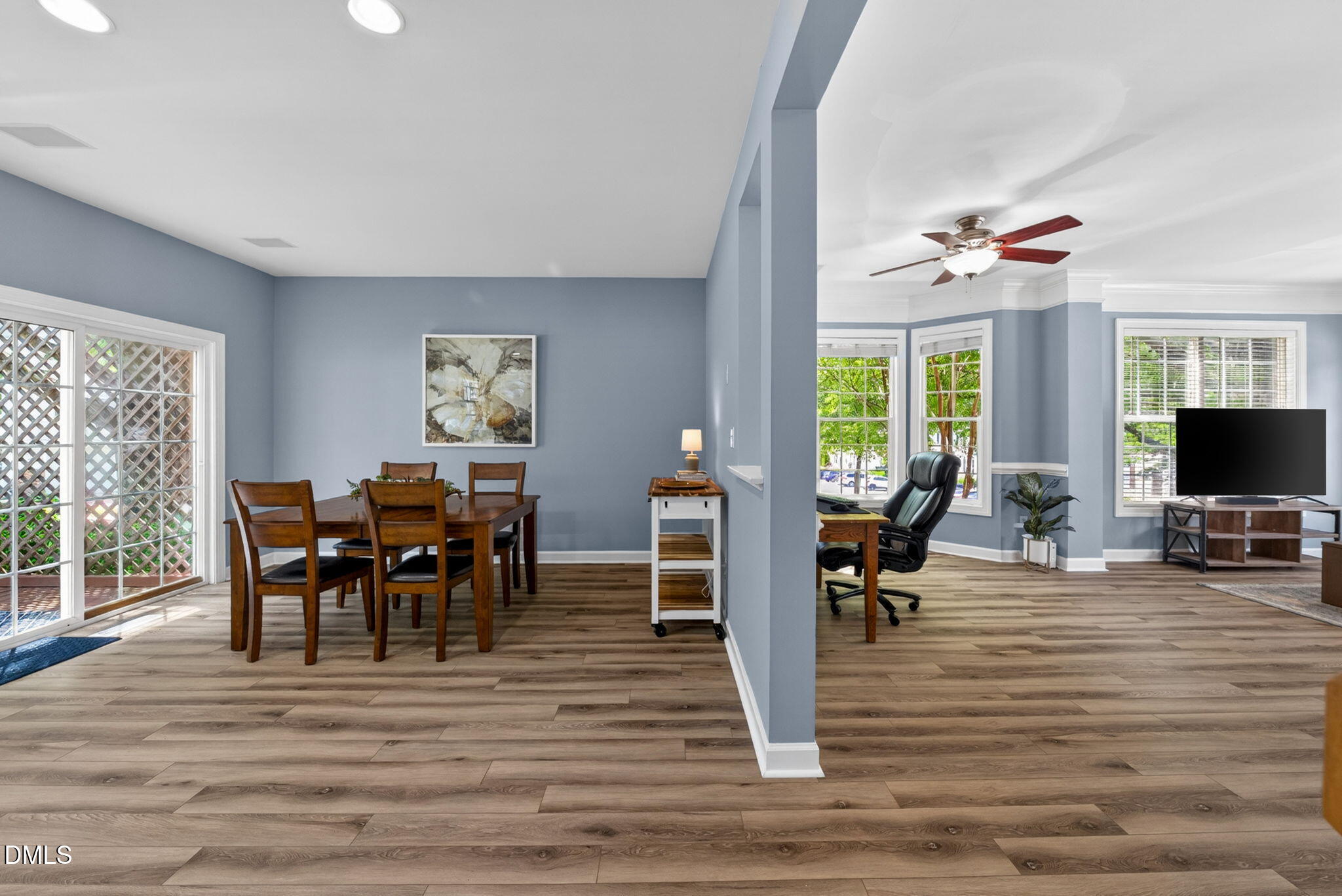 5500 Vista View Court Raleigh, NC 27612 - Photo 15 of 38 a view of a dining room with furniture window and wooden floor