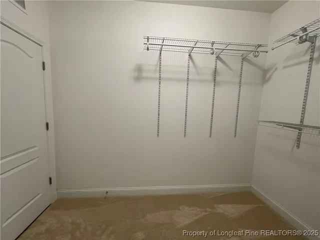 a view of a room with racks on the wall