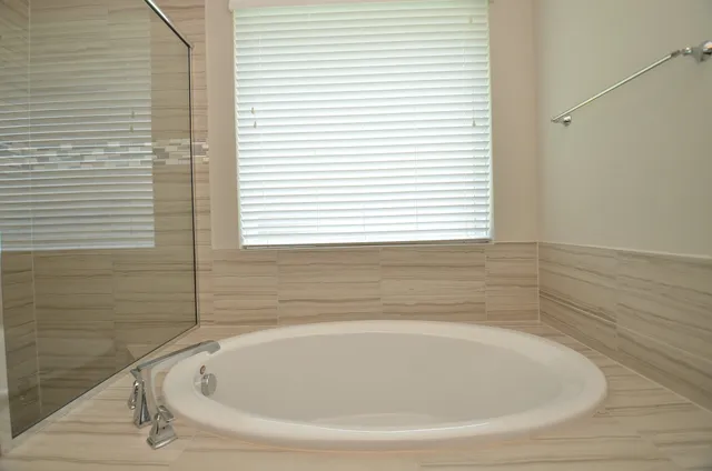 a bathroom with a bathtub