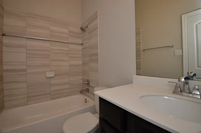 a bathroom with a sink and a bathtub