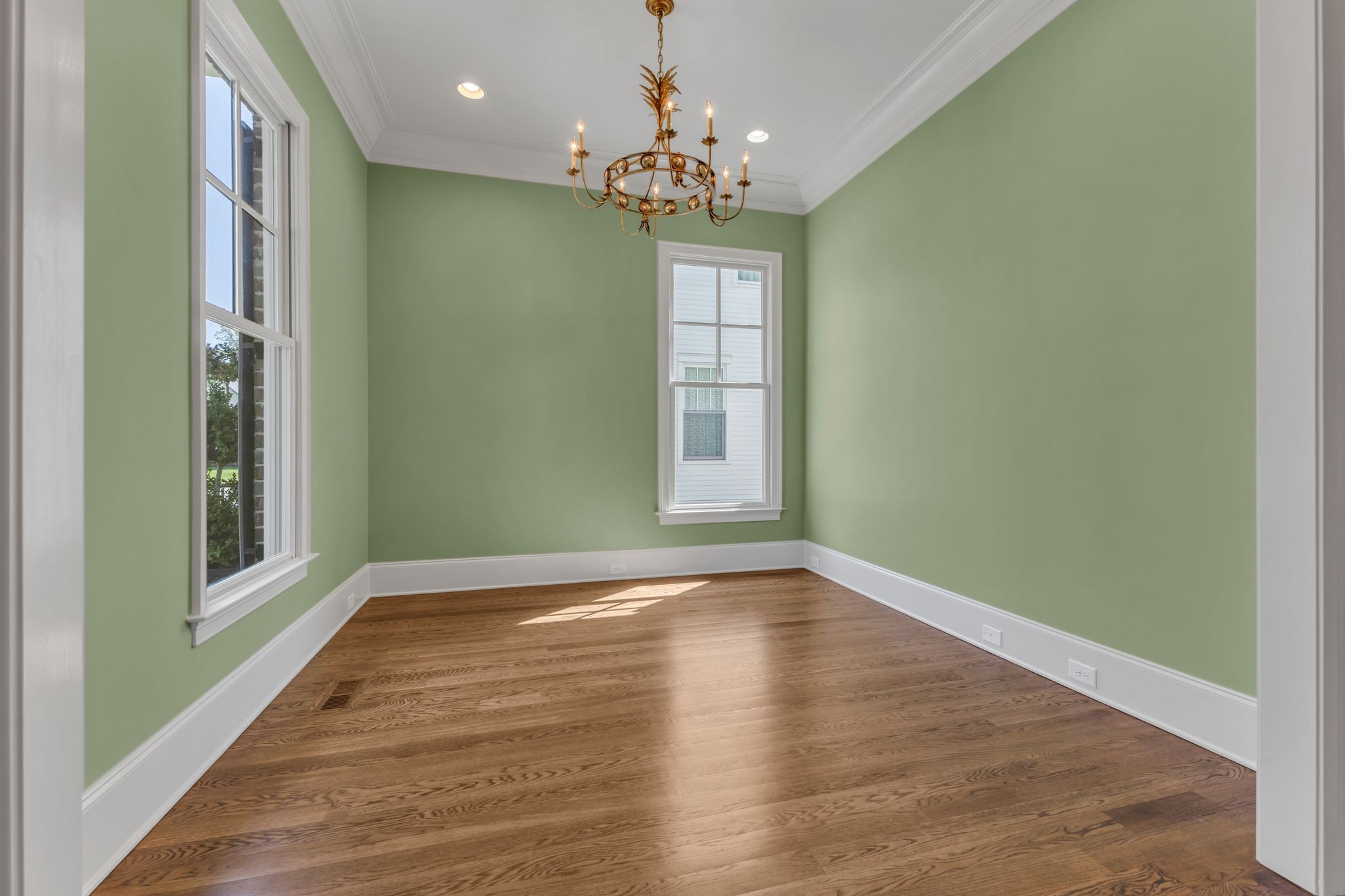 155 Splendor Ridge Drive Franklin, TN 37064 - Photo 13 of 52 a view of a big room with wooden floor and chandelier