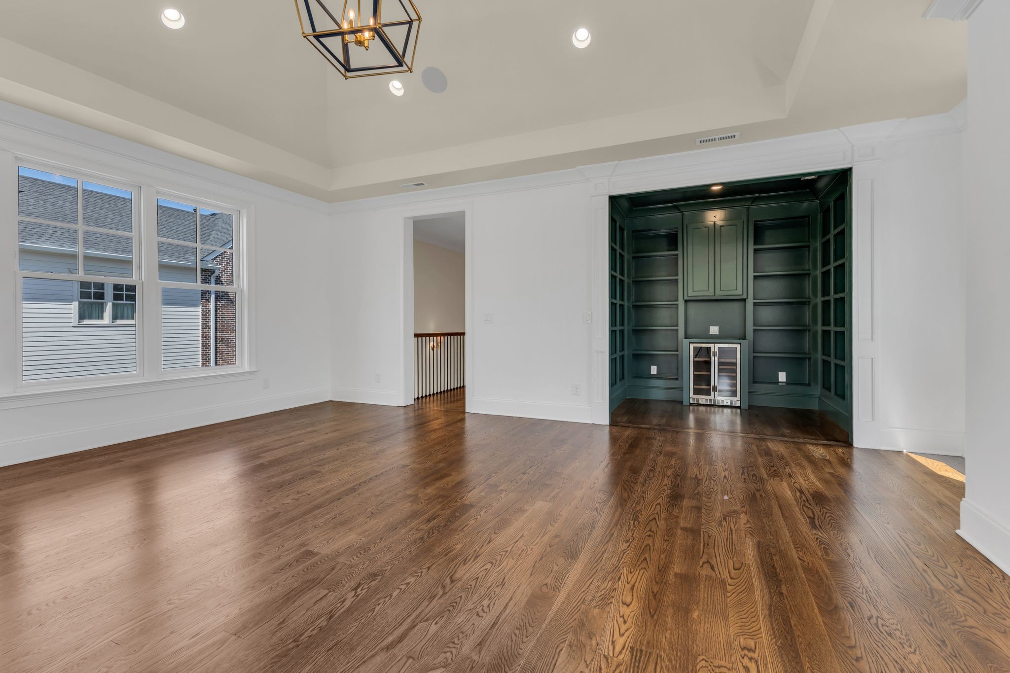 155 Splendor Ridge Drive Franklin, TN 37064 - Photo 27 of 52 an empty room with wooden floor and windows
