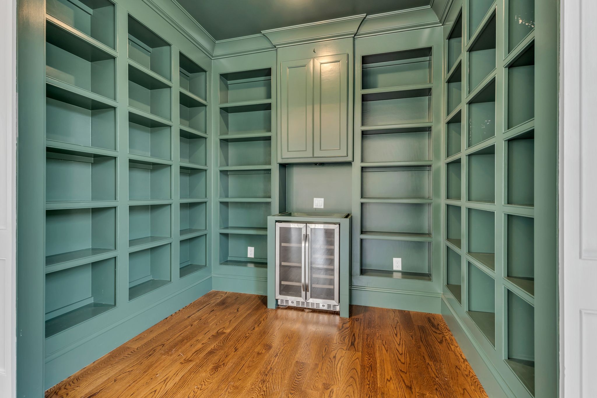 155 Splendor Ridge Drive Franklin, TN 37064 - Photo 28 of 52 a view of an empty room with a wooden shelves and a window