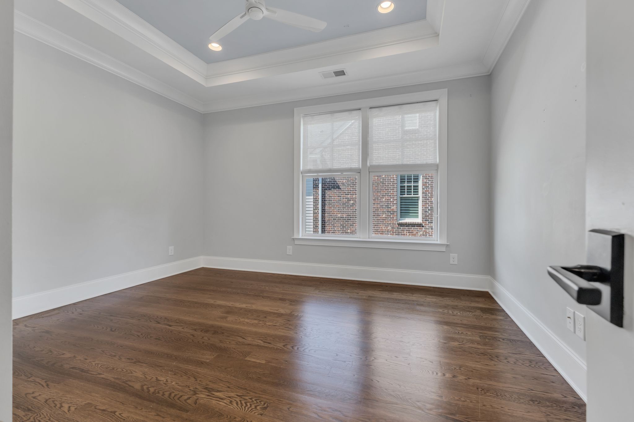 155 Splendor Ridge Drive Franklin, TN 37064 - Photo 31 of 52 a view of an empty room with wooden floor and a window