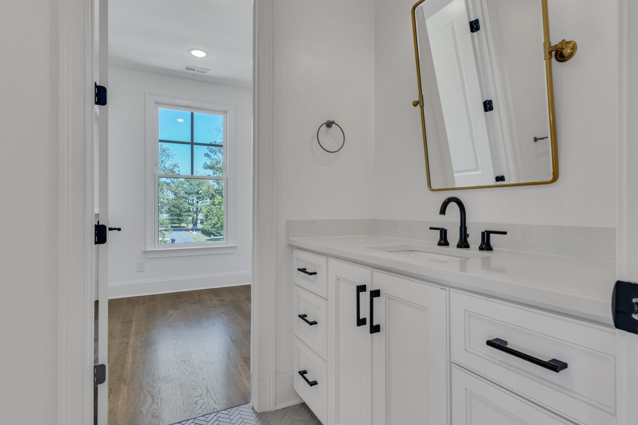 155 Splendor Ridge Drive Franklin, TN 37064 - Photo 33 of 52 a bathroom with a sink vanity and mirror