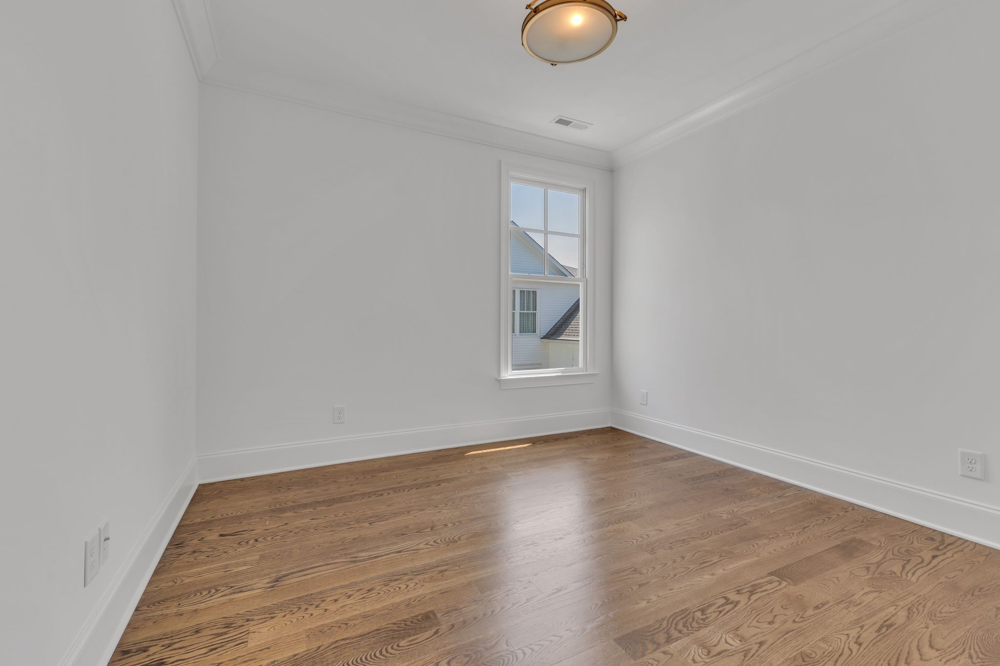 155 Splendor Ridge Drive Franklin, TN 37064 - Photo 38 of 52 an empty room with wooden floor and windows