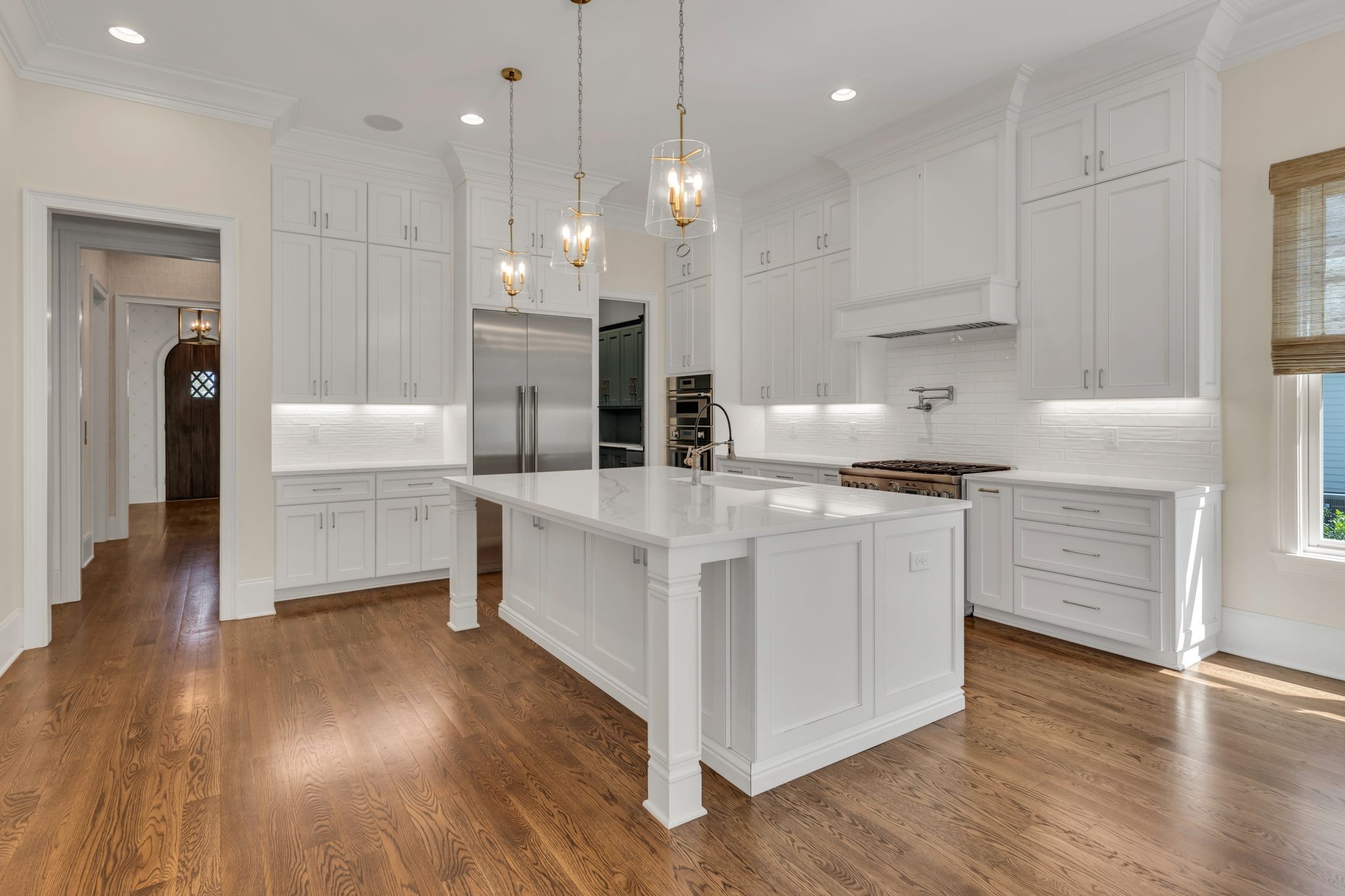 155 Splendor Ridge Drive Franklin, TN 37064 - Photo 6 of 52 a kitchen with stainless steel appliances granite countertop a stove a sink and a refrigerator
