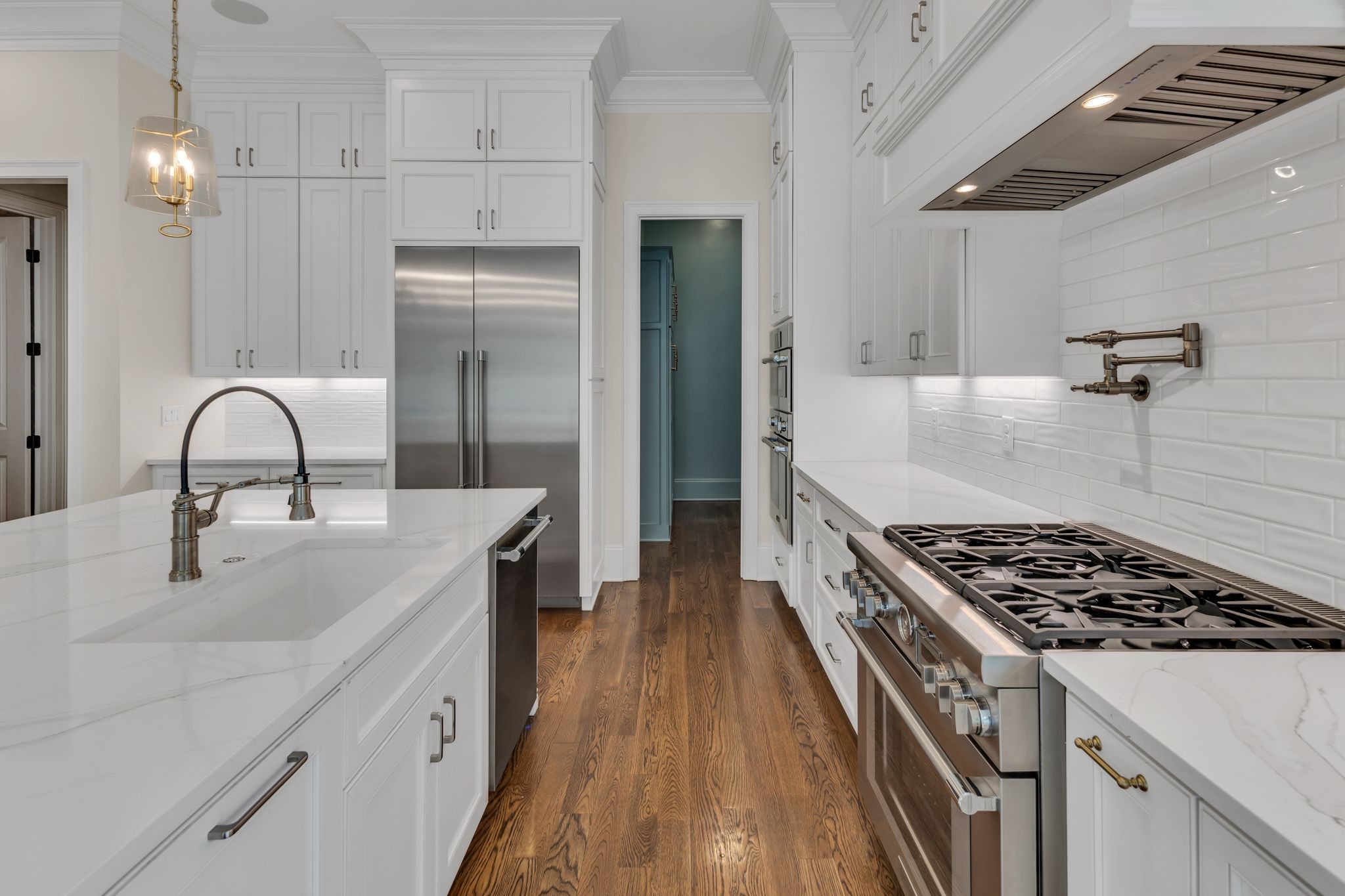 155 Splendor Ridge Drive Franklin, TN 37064 - Photo 7 of 52 a kitchen with sink a stove and refrigerator