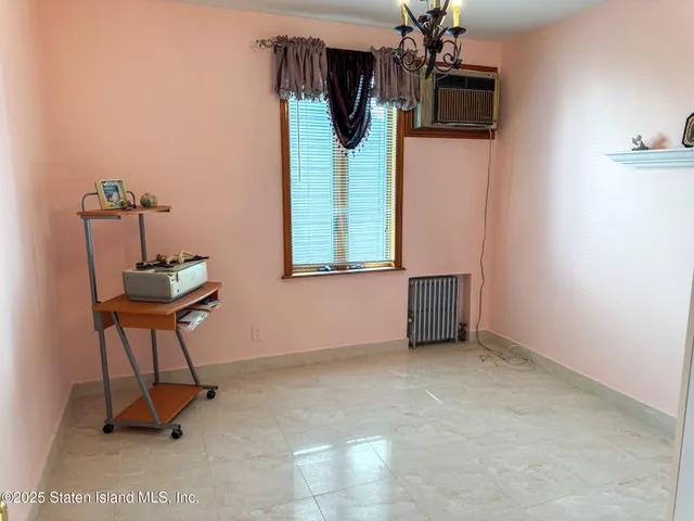 a view of a dinning table and chairs in the patio