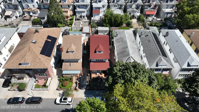 an aerial view of residential house with outdoor space