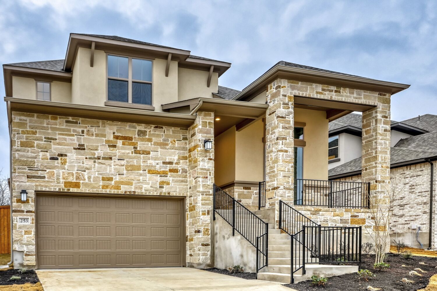 253 Prickly Poppy Loop Kyle, TX 78640 - Photo 1 of 11 a front view of a house