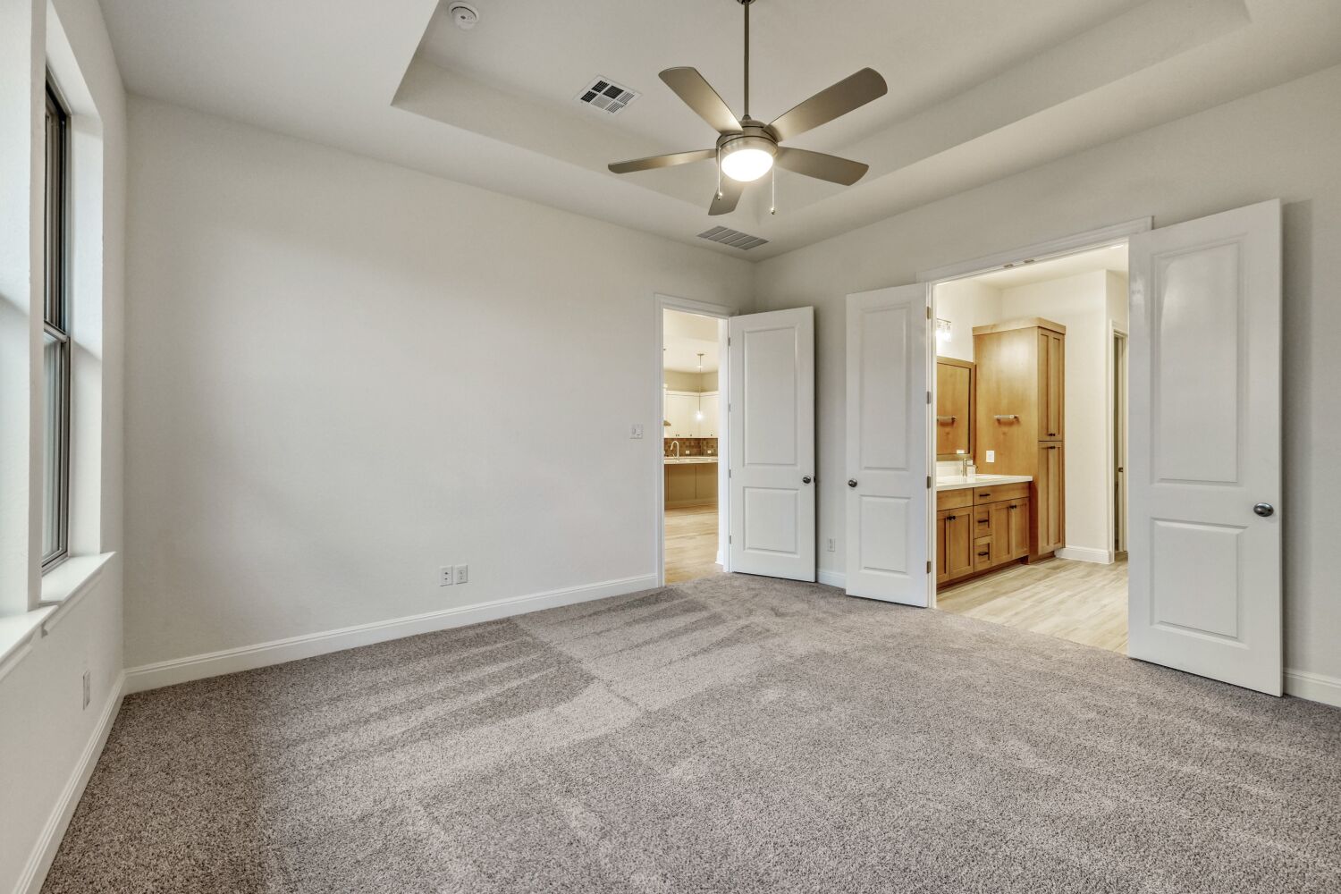 253 Prickly Poppy Loop Kyle, TX 78640 - Photo 7 of 11 an empty room with closet and a ceiling fan