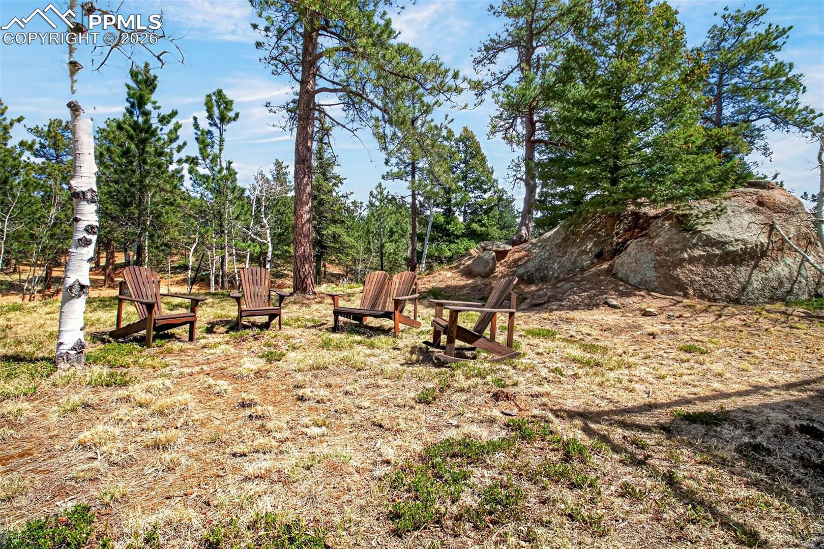 255 Summit Road Manitou Springs, CO 80829 - Photo 44 of 48 Front yard with rock outcroppings