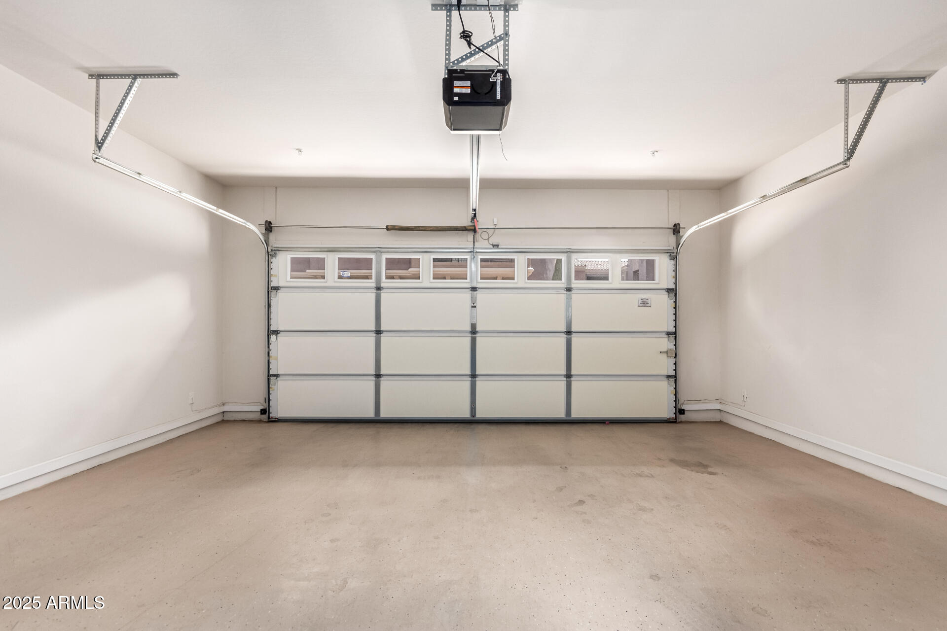 3935 East Rough Rider Road, Unit 1197 Phoenix, AZ 85050 - Photo 23 of 31 a view of a garage
