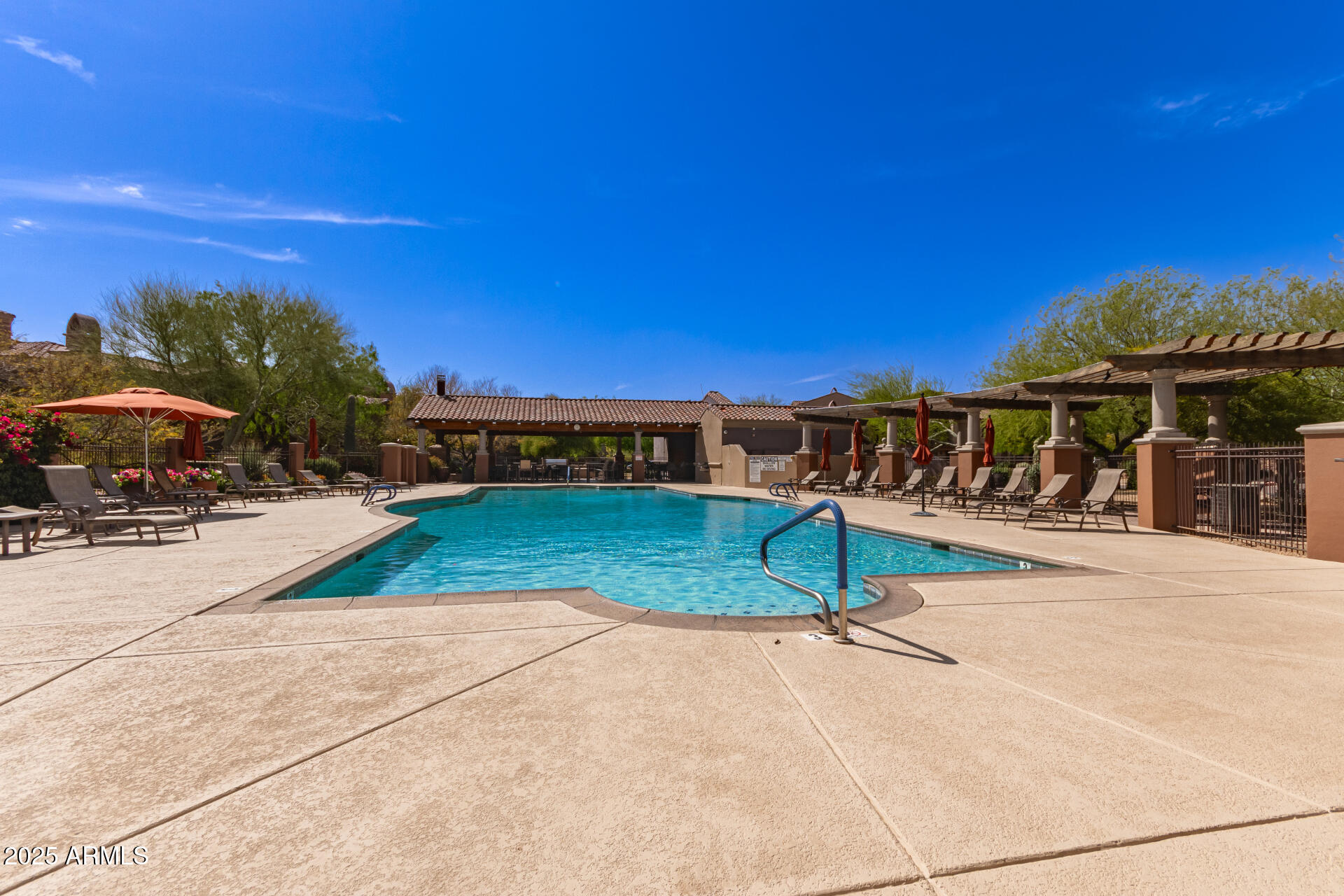 3935 East Rough Rider Road, Unit 1197 Phoenix, AZ 85050 - Photo 31 of 31 a view of a building with a yard