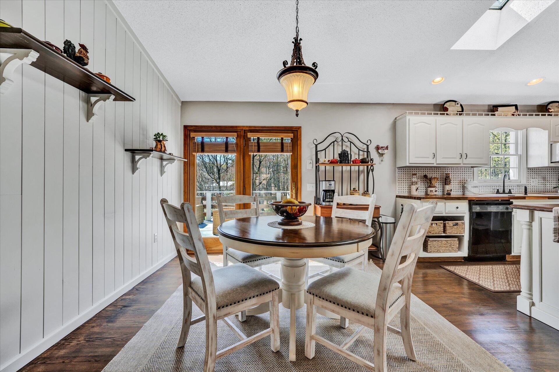 1077 Hopkins Road Rocky Mount, VA 24151 - Photo 20 of 69 a view of a dining room with furniture and wooden floor