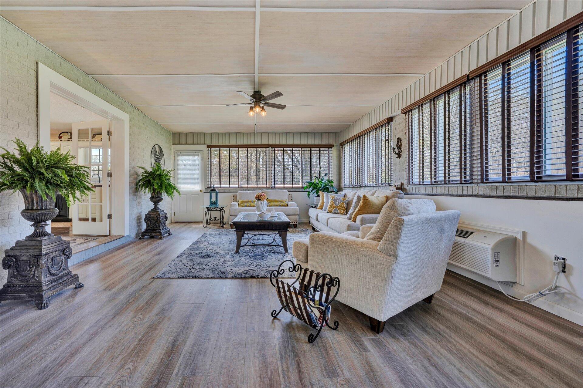 1077 Hopkins Road Rocky Mount, VA 24151 - Photo 25 of 69 a living room with furniture and a wooden floor