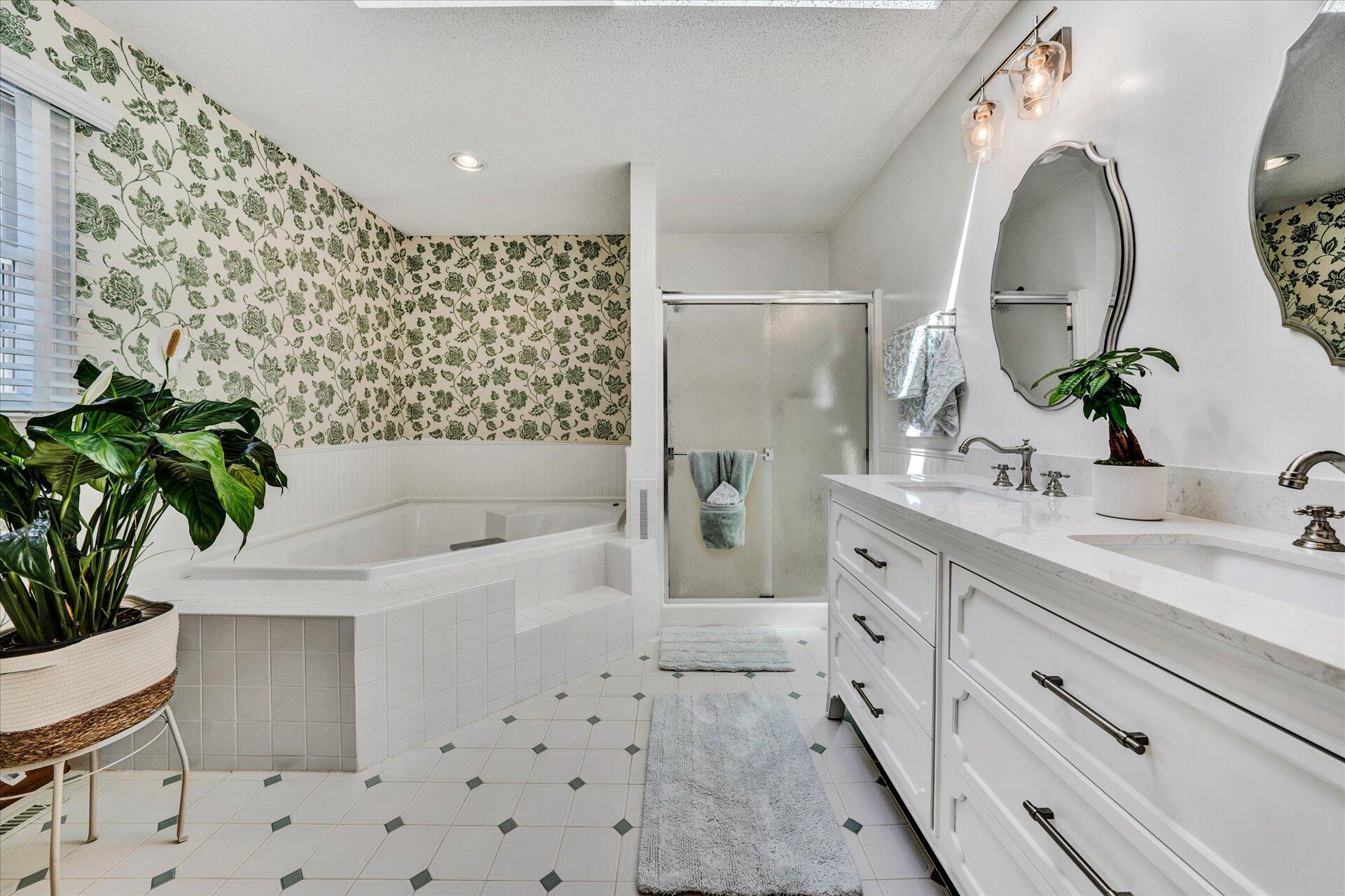 1077 Hopkins Road Rocky Mount, VA 24151 - Photo 35 of 69 a spacious bathroom with a granite countertop sink a toilet and shower