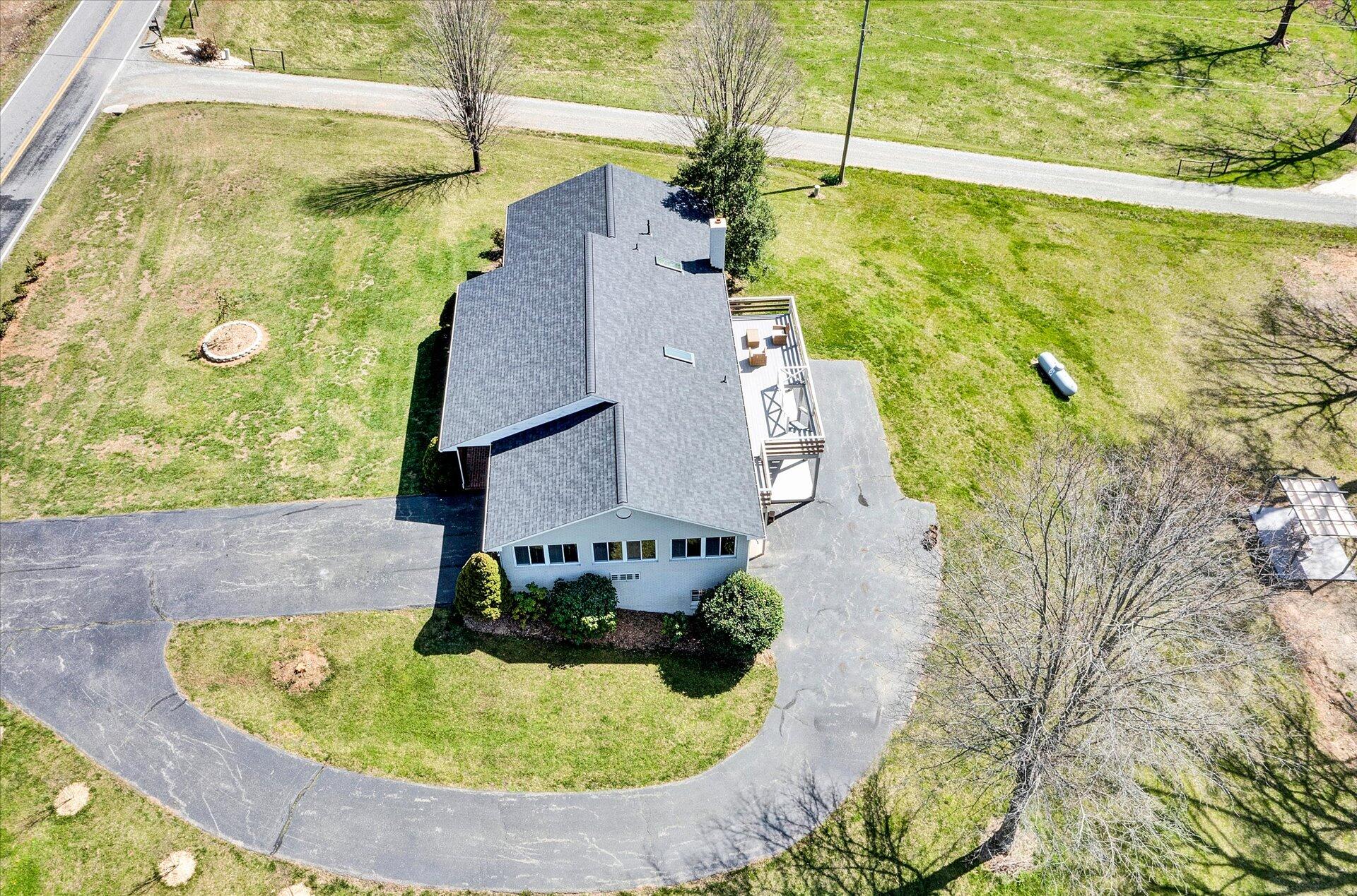 1077 Hopkins Road Rocky Mount, VA 24151 - Photo 62 of 69 a view of a swimming pool with a yard